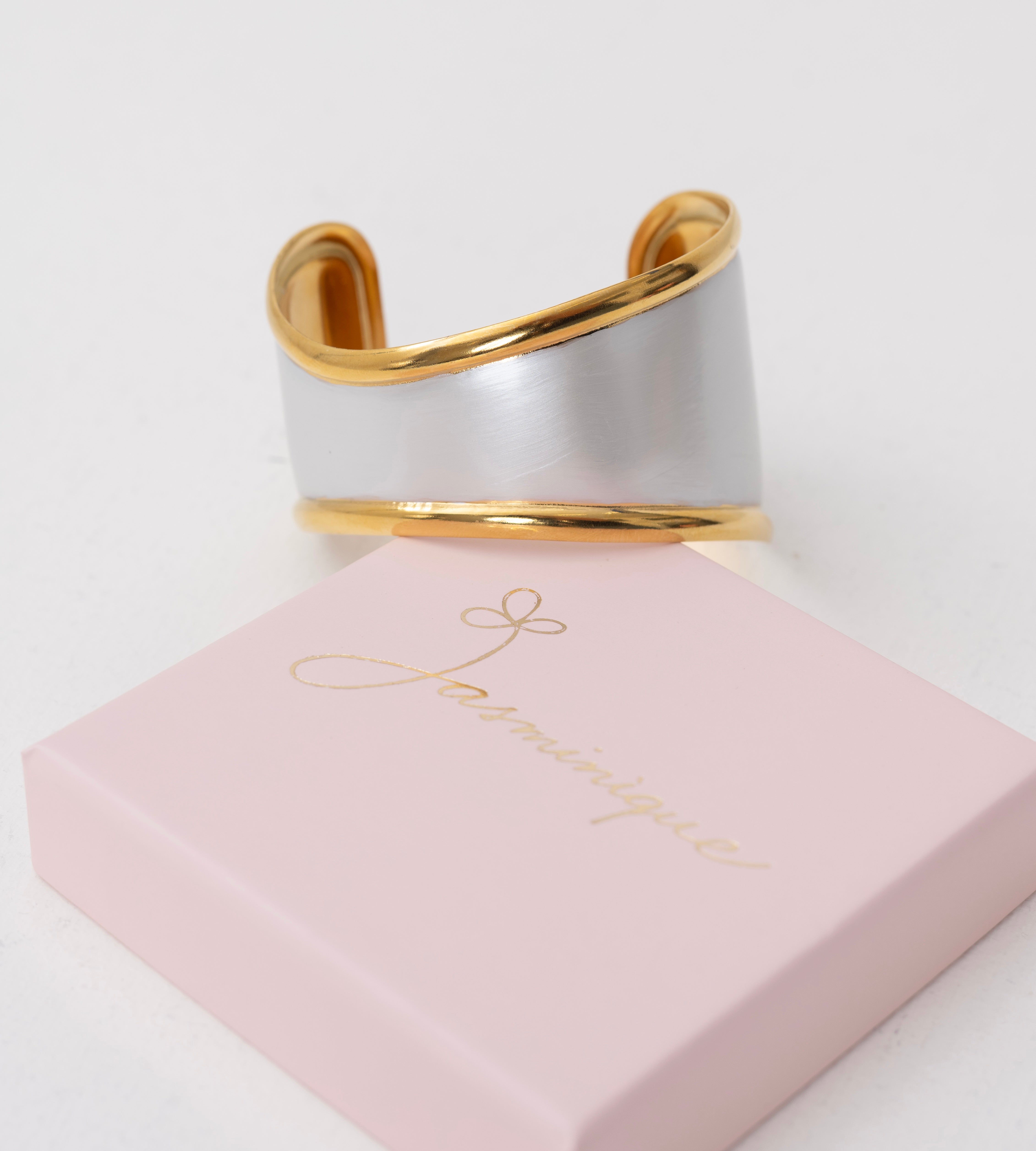 Bracciale rigido bianco e oro