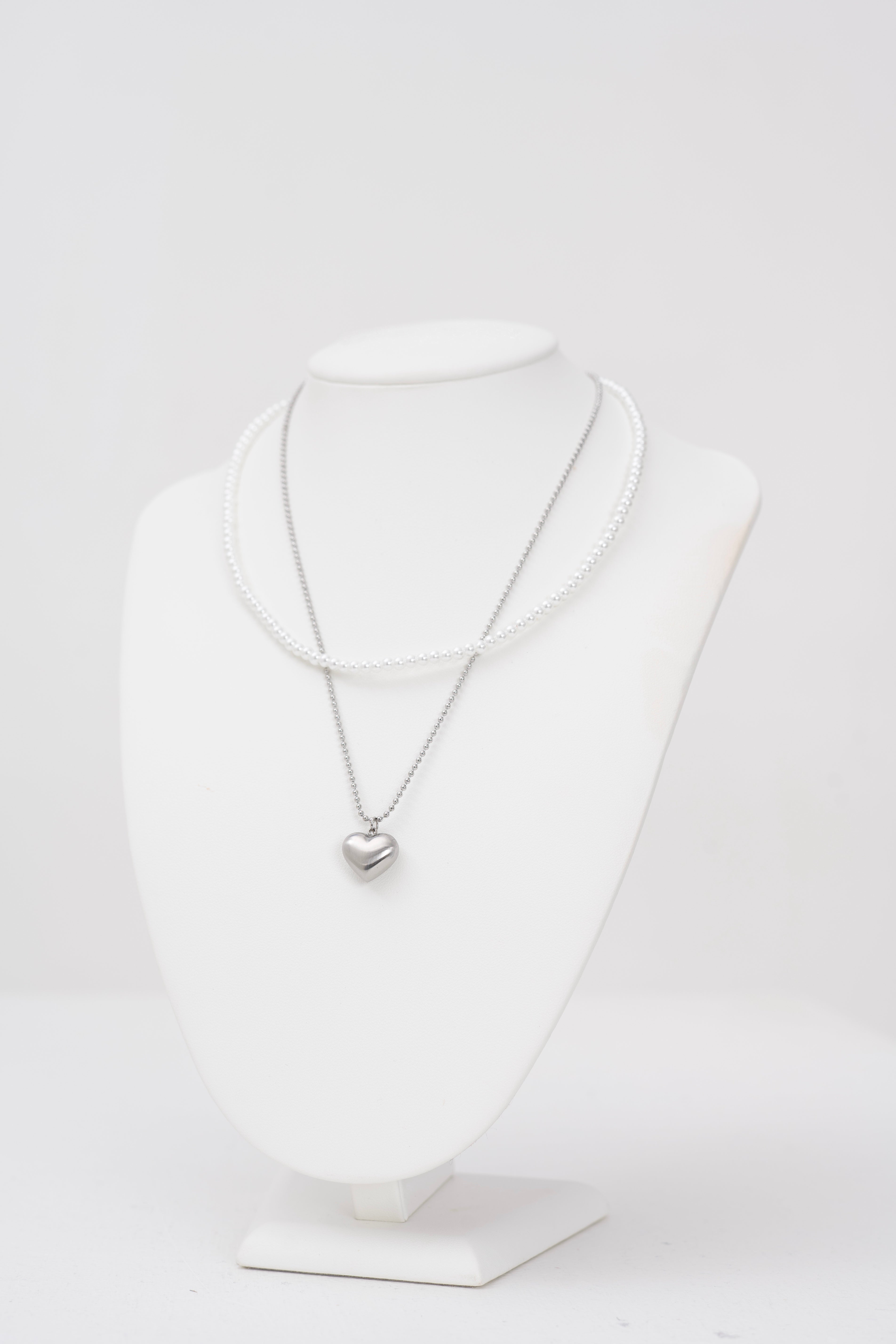 Collana morbida perle bianche e acciaio